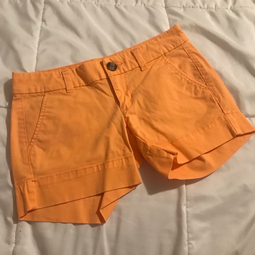 Solid color chino shorts.